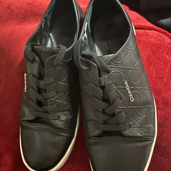 Calvin Klein Shoes - Calvin Klein black sneakers with all over print (used/flaws)